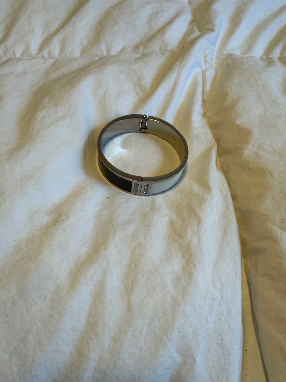 Silver Tone Hinged Bangle Bracelet with Rhinestone Accent